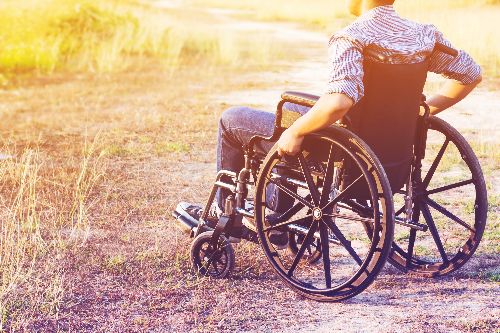 Guy in wheelchair looking back