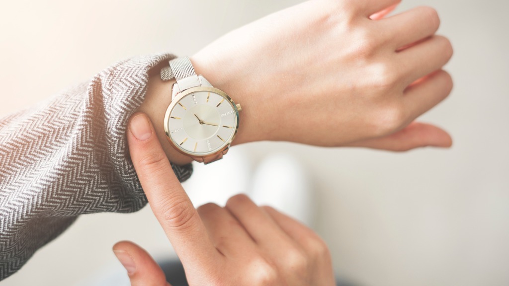 woman-checking-time-her-watch-aia-malaysia