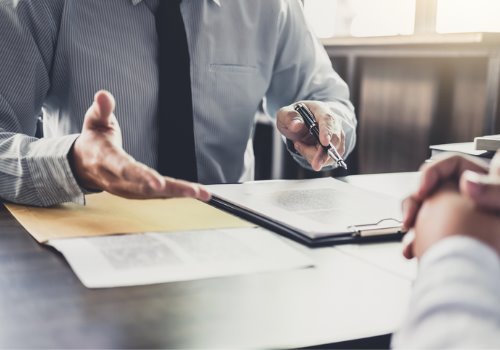 businessman-hand-contract-discussion-aia-malaysia.jpg