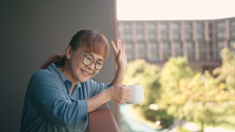woman waving
