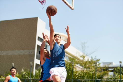 men playing basketball