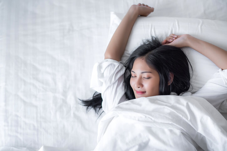 Woman Waking Up From Sleep