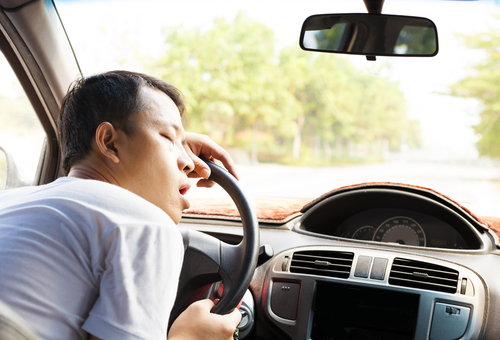 ASLEEP AT CAR STEERING