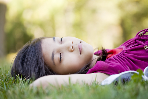 girl sleep grass