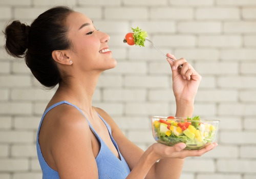 asian-woman-with-salad-bowl