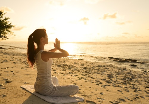 morning-yoga-and-meditating-on-the-beach-aia-malaysia