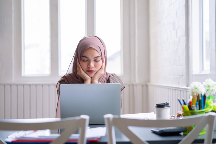 woman-sleeping-desk-aia-malaysia