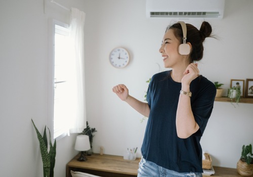 young-woman-dancing-to-music-in-the-bedroom-picture-aia-malaysia