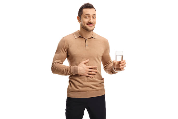 Man with glass of water