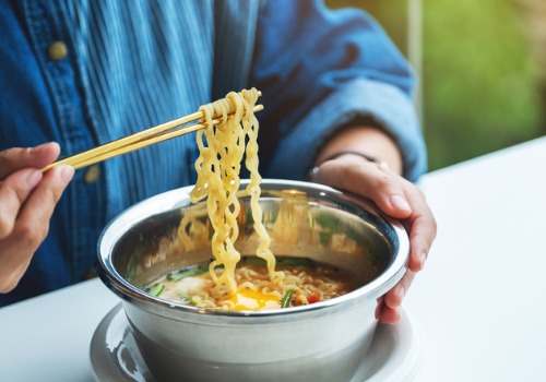 Woman eating ramyeon