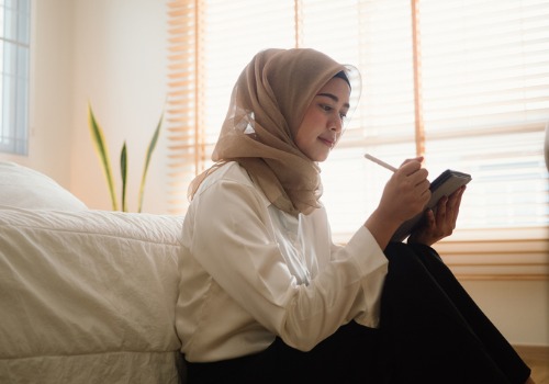 woman using ipad