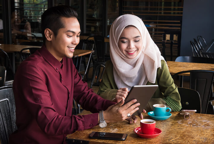 Couple looking at tablet