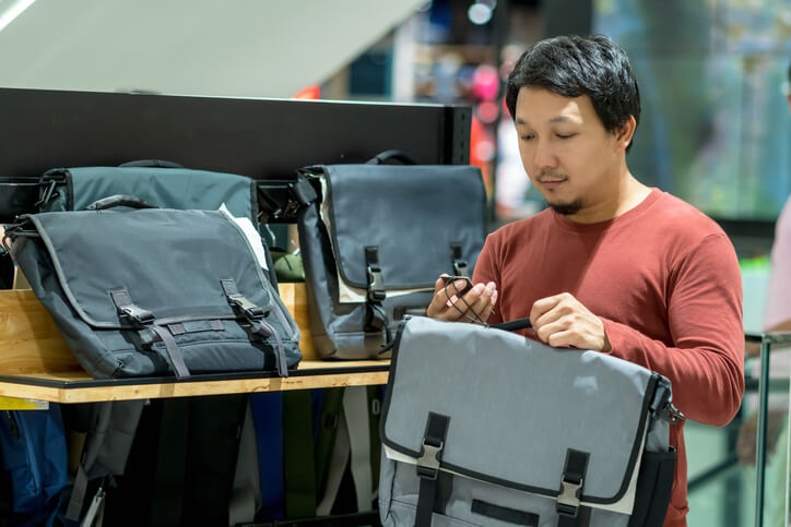 Man Checking Price Tag