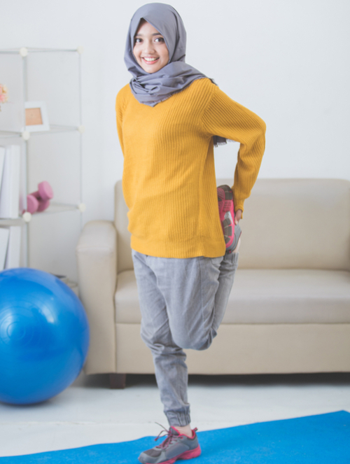 women stretching legs