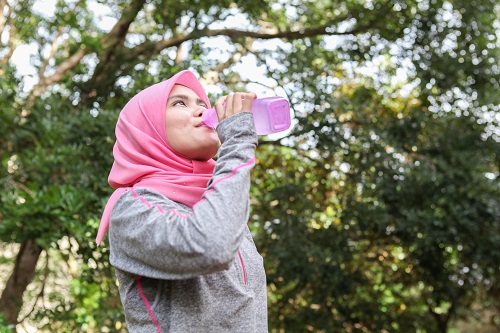 women drinking water